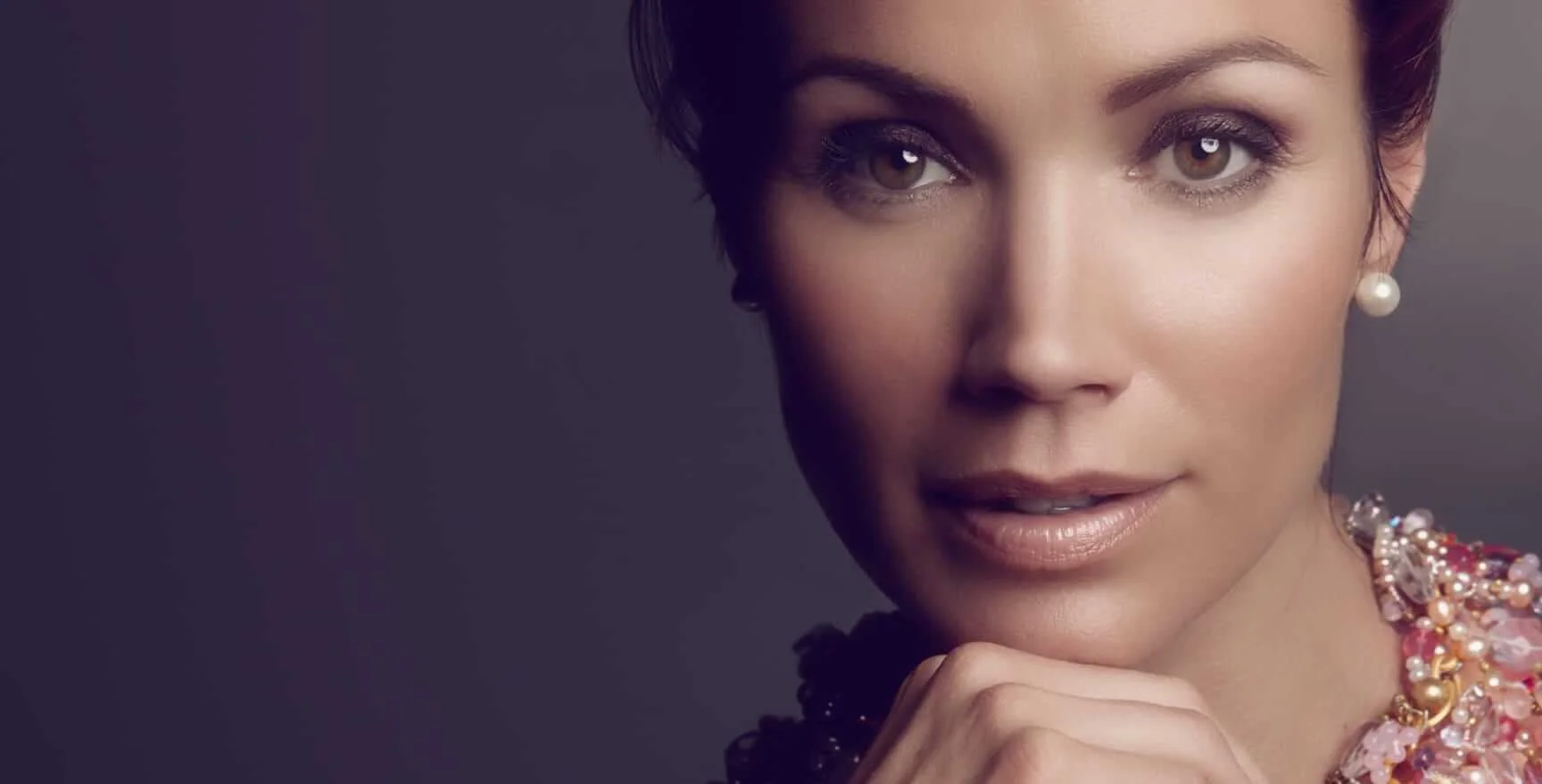 Woman with natural-looking skin in a studio portrait