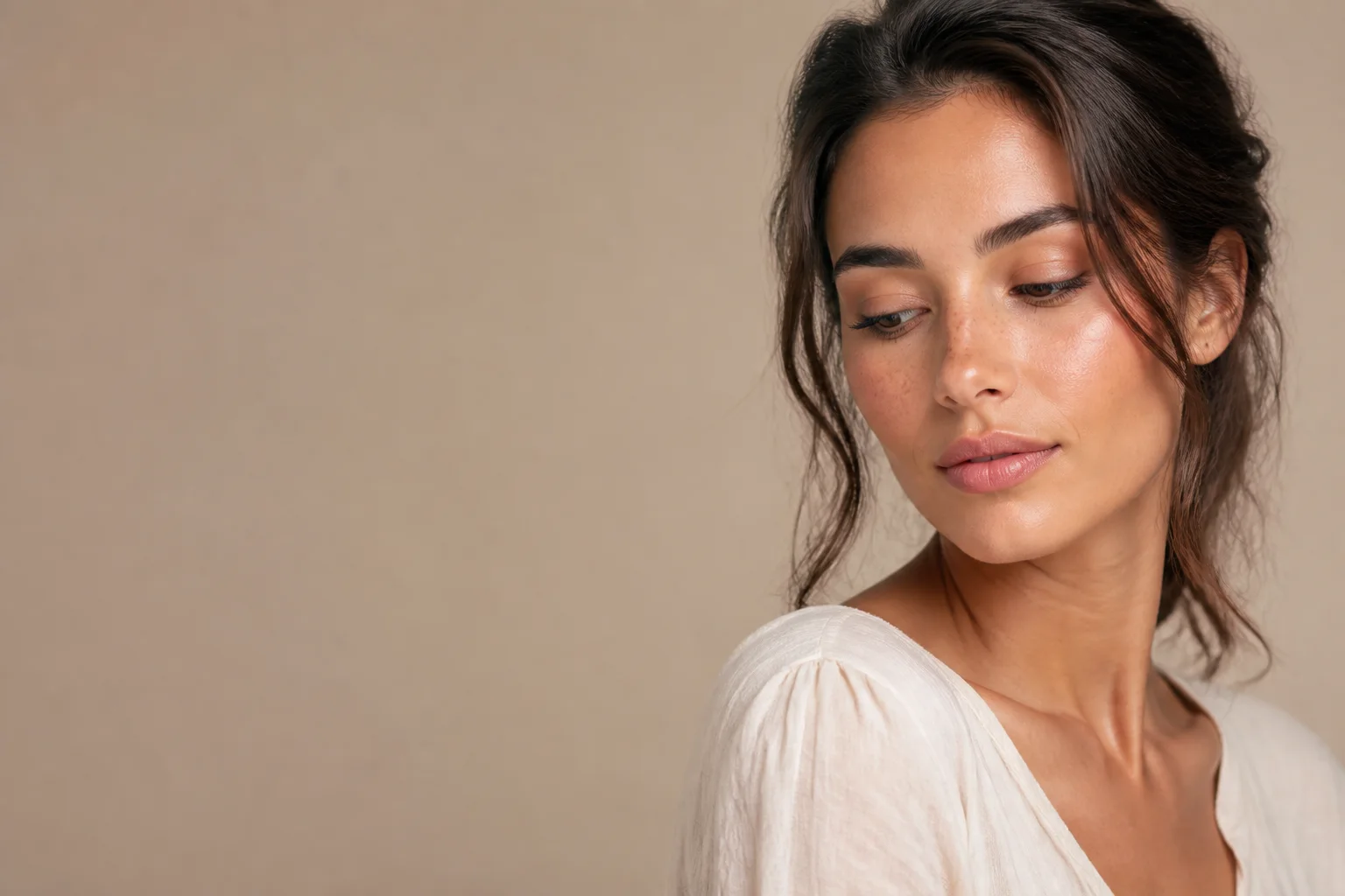 Woman with natural-looking skin representing melasma care