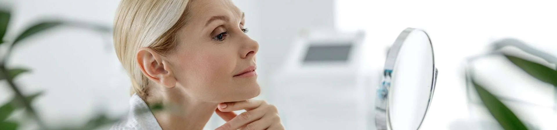 Patient receiving a clinical facial skin assessment