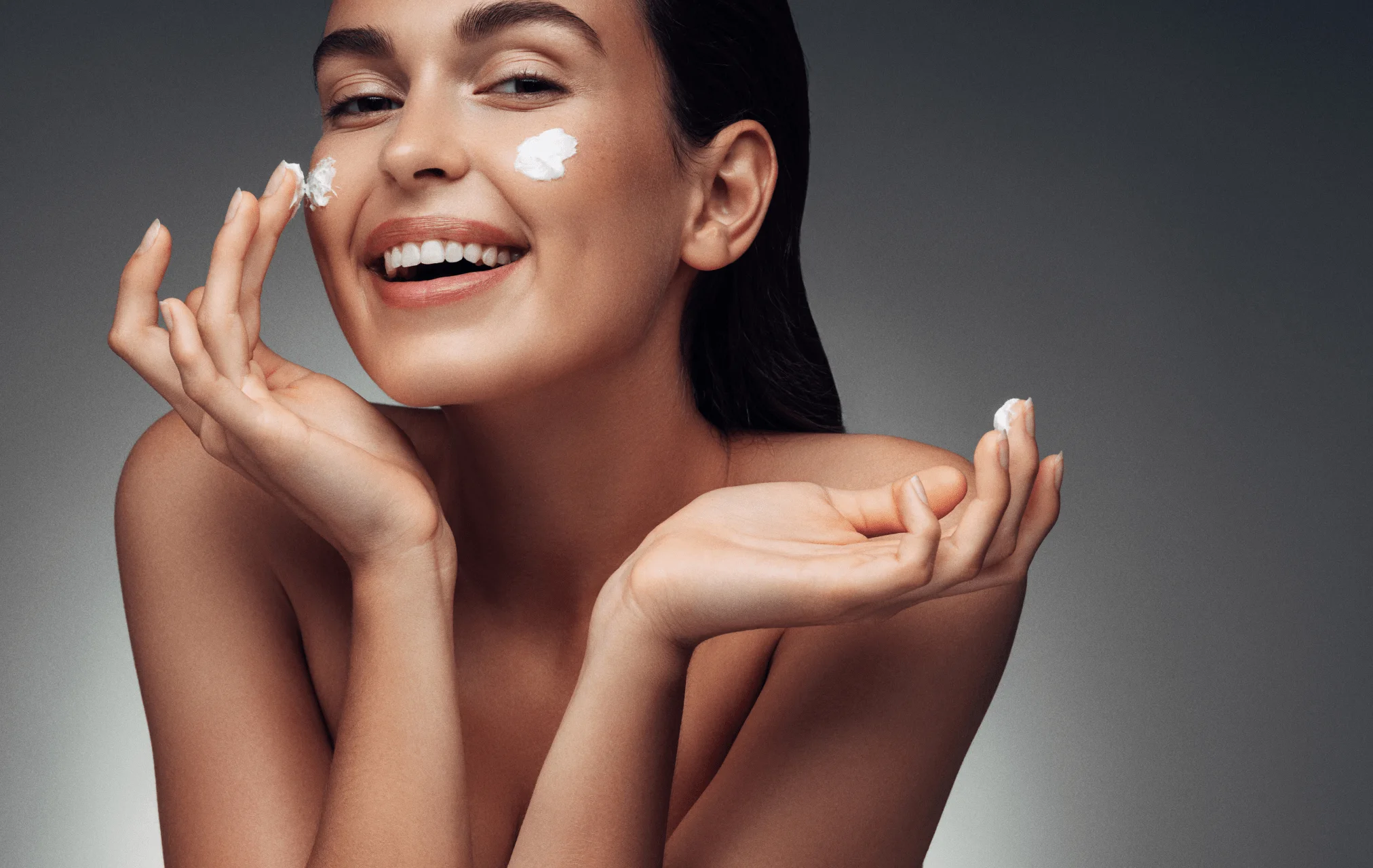 Woman applying a professional skincare product